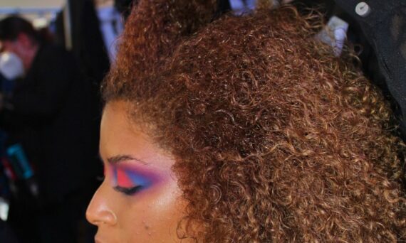 woman with brown curly hair